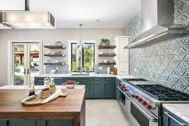 "DIY peel-and-stick tile backsplash - one of the 10 Smart Modular Kitchen Design Ideas on a Budget."
