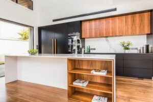 "Durable countertop and efficient storage solutions in a budget-friendly modular kitchen."