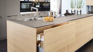 "Durable laminate kitchen cabinets in a variety of finishes - part of the 10 Smart Modular Kitchen Design Ideas on a Budget."