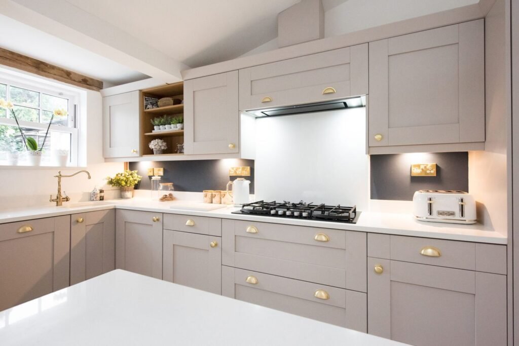  "Freshly painted kitchen cabinets in light colors - a budget-friendly modular kitchen design idea